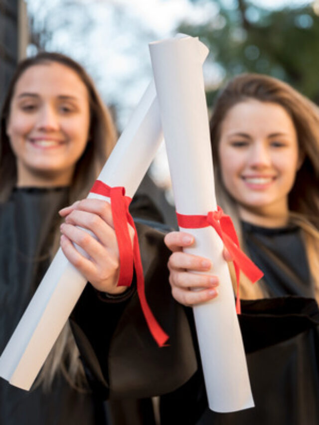 girls-graduation-showing-their-certificates (1)